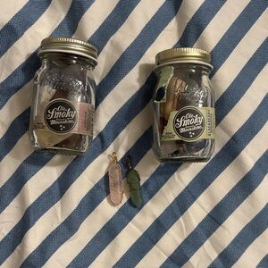 Ole Smoky Moonshine Jars with Crystal Charms and crystals in the jars